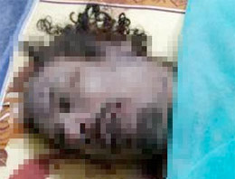 Kaddafi'yi böyle gömmüşler!