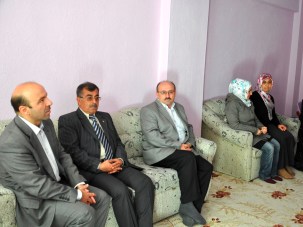 Tüfekci'den şehit ailelerine ziyaret