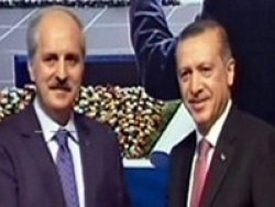 Erdoğan, Kurtulmuş'a rozetini taktı
