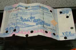 Sahte parayla alışveriş yaptılar