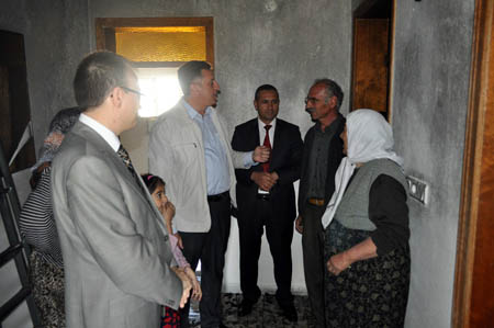 Evi yanan kadına yardım