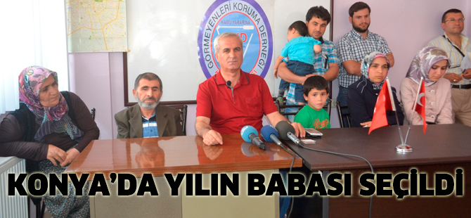 Konya'da "yılın babası" görme ve yürüme engelli baba seçildi
