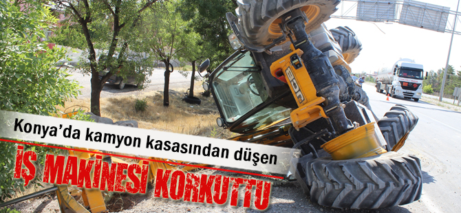 Konya'da iş makinesi, kamyon kasasından düştü