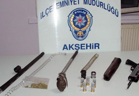 El bombası ve av tüfeğiyle yakalandı