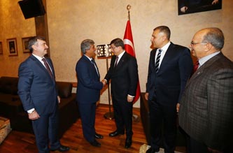 Ekrem Tulukçu'ya rozetini Başbakan taktı