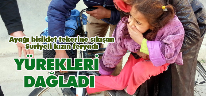 Ayağı bisiklet tekerine sıkışan Suriyeli kızın feryadı