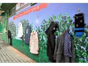 Veren el ile alan elin buluştuğu "paylaşım duvarı"