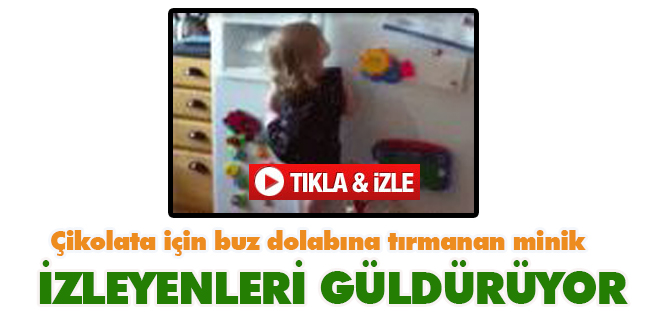 Çikolata için buz dolabına tırmanan minik