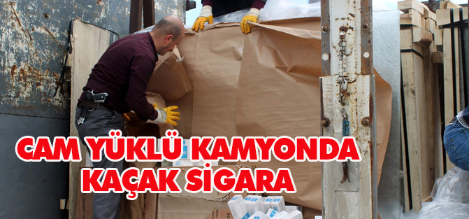 Camlar kırılınca 90 bin paket kaçak sigara çıktı