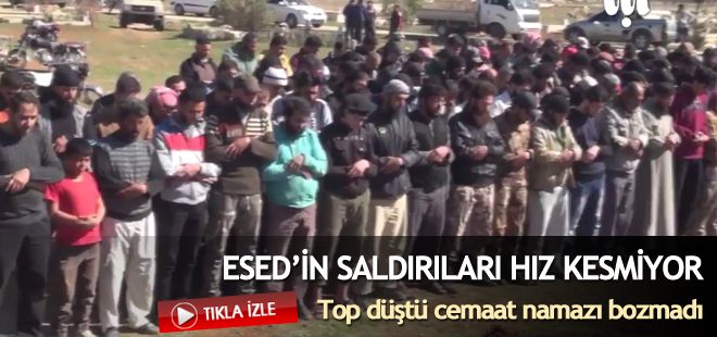 Suriye'de cenaze namazı sırasında düşen topa cemaat aldırmadı