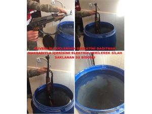 Diyarbakır'da tuzaklı bidonlarda silah ele geçirildi