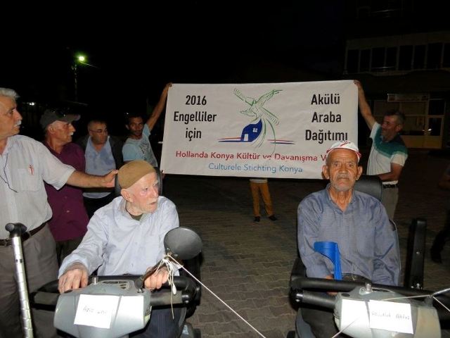 Yalıhüyük’te engelli vatandaşlara akülü araç dağıtıldı