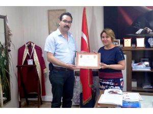 Gazeteciler Cemiyeti'nden Aslan'a teşekkür belgesi