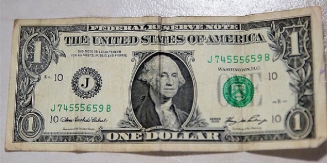 Konya'da okul yöneticiliği yapan Erarslan'ın evinden 1 dolar ve vesikalık...