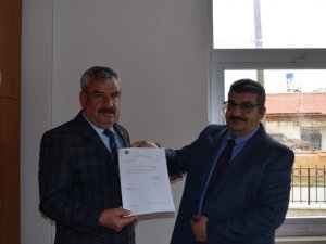 MHP Ilgın İlçe Başkanı Ok mazbatasını aldı