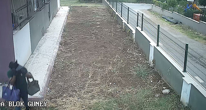 Çaldığı kadın çantasıyla yüzünü kapattı polisten kaçamadı