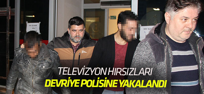 Televizyon hırsızları devriye atan polise yakalandı