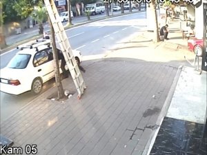 Otomobilden telefon ve cüzdan çalan hırsız yakalandı