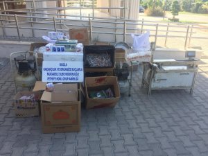 Fethiye’de kaçak tütün imalathanesine baskın: 2 tutuklama