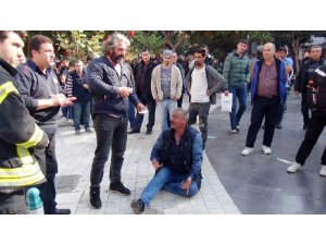 Üzerine benzin döküp kendini yakmak istedi