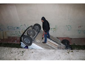 Otomobil sitenin bahçesine düştü: 3 yaralı
