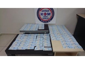 Uyuşturucu araması yapılan araçtan 57 bin lira sahte para çıktı