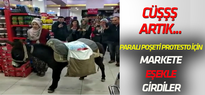 Paralı poşeti protesto için markete eşekle geldiler