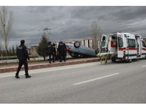 Takla atan araçtan hafif yaralı kurtuldu