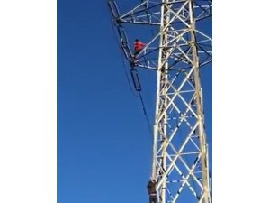 Yüksek gerilim hattı direğine çıkan genç, yürekleri ağza getirdi