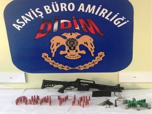 İş yerine yapılan aramada ruhsatsız silah ele geçirildi