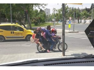 7 kişi bir motosiklette