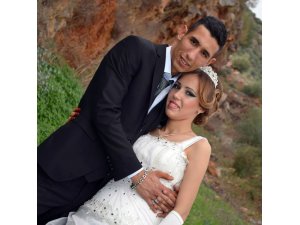 Boşanmak istediği eşinin silahı tutukluk yapınca ölümden kurtuldu