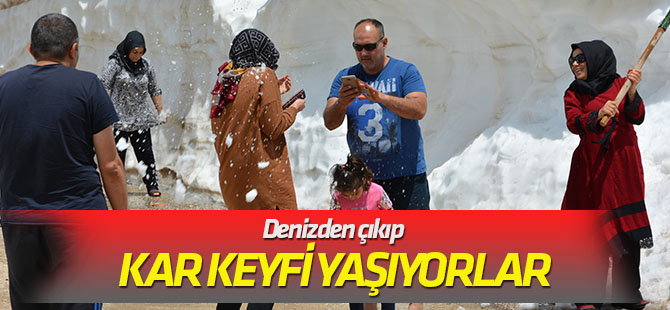 Denizden çıkıp kar keyfi yaşıyorlar