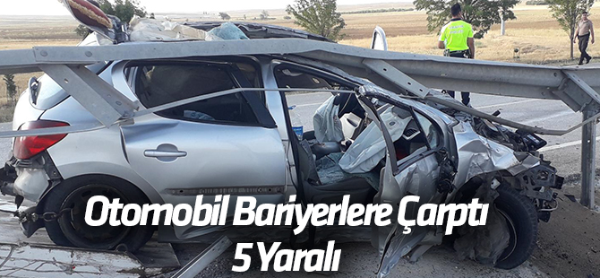 Otomobil bariyerlere çarptı: 5 yaralı