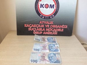 Ayvalık’ta taksiciye sahte para şoku