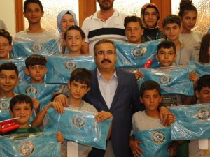 Demir şehit ve gazi çocuklarını ağırladı