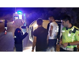 Takla atan otomobilden yara almadan kurtuldu