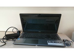 Dizüstü bilgisayar hırsızları önce kameralara sonra da polise yakalandı