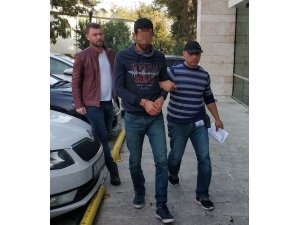 Balıkçı teknesiyle kaçarken denizde yakalanan zanlı cezaevine gönderildi