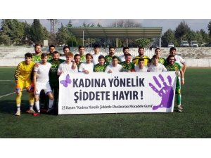 UBSK’dan kadına şiddete pankartlı farkındalık