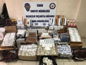 İzmir’de 7 bin 200 paket kaçak sigara ve 185 şişe sahte içki ele geçirildi