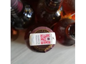 İzmir’deki markette çok sayıda sahte bandrollü içki ele geçirildi
