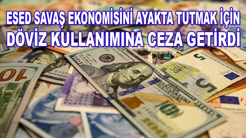 Esed savaş ekonomisini ayakta tutmak için döviz kullanımına hapis cezası getirdi