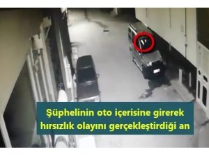 Park halindeki araçtan hırsızlık yaptı kameralara yakalandı