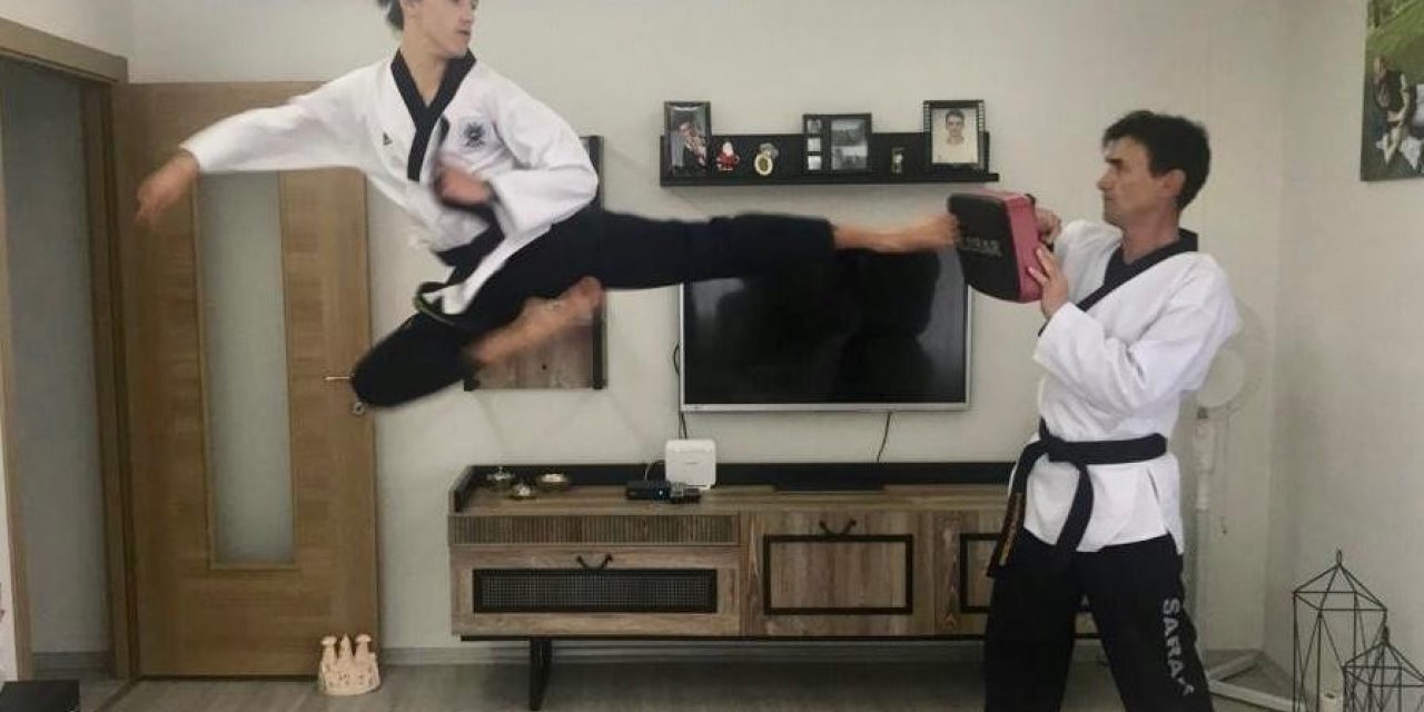 Milli tekvandocu baba-oğul evde antrenman yapıyor