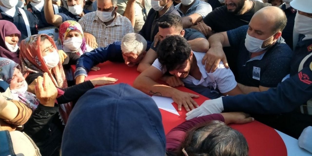 Şehit eşinin kamuflajını giydi