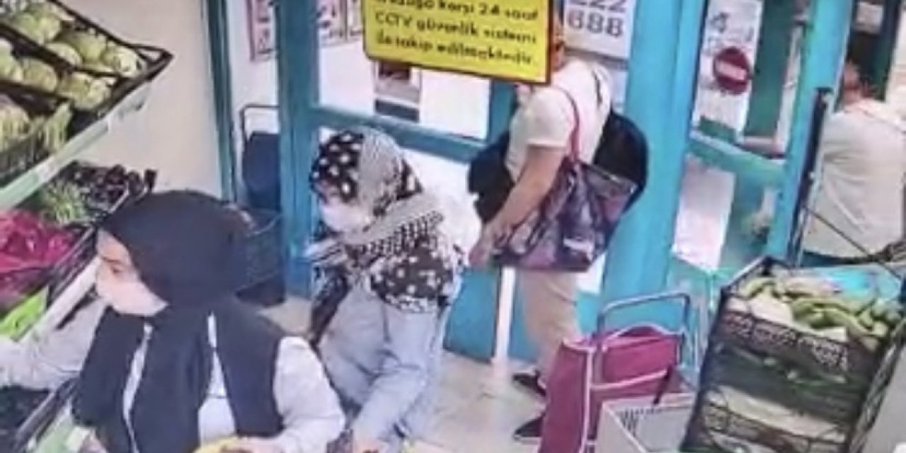 Yankesici çetesinin kadının cebinden telefonunu çaldığı anlar kamerada