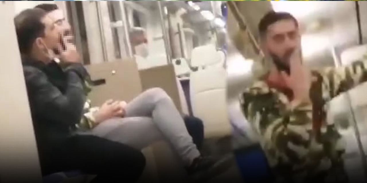 Trende sigara içen ve maske takmayan iki kişiye ceza kesildi