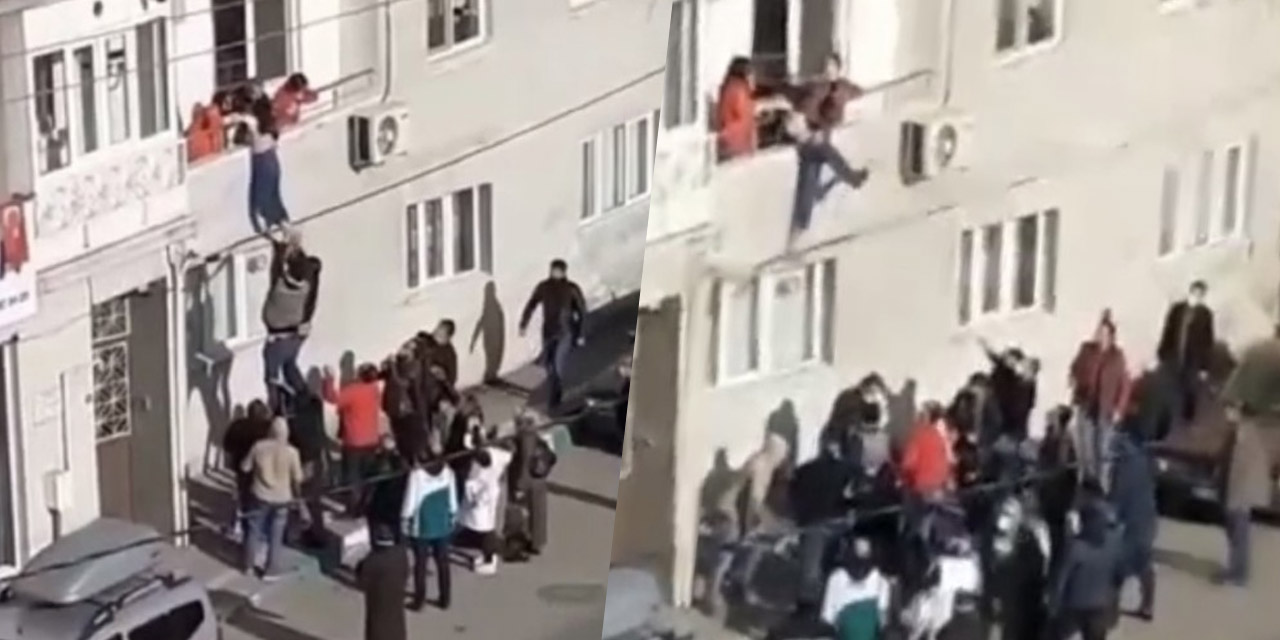 Balkondan atlamaya çalışan genç kızı babası son anda kurtardı
