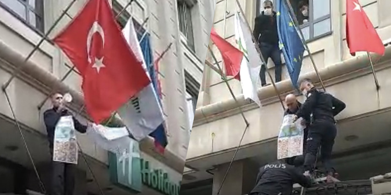 İstanbul'da bir garip olay! Otel çalışanı girişe tırmanıp megafonla etrafa seslendi